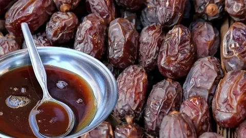 تصویر 3 از شیره خرما طبیعی اصل با عطر و رنگ طبیعی
